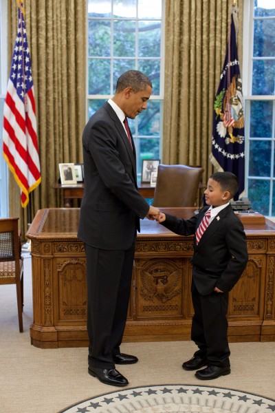 Barack Obama fist-bumps Make-a-Wish child Juan Blanco in the Oval Office, 2010