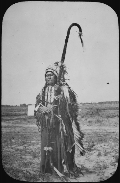 Chief Powder Face of the Arapaho, standing full-length, wearing war costume, 1864 - NARA - 520069