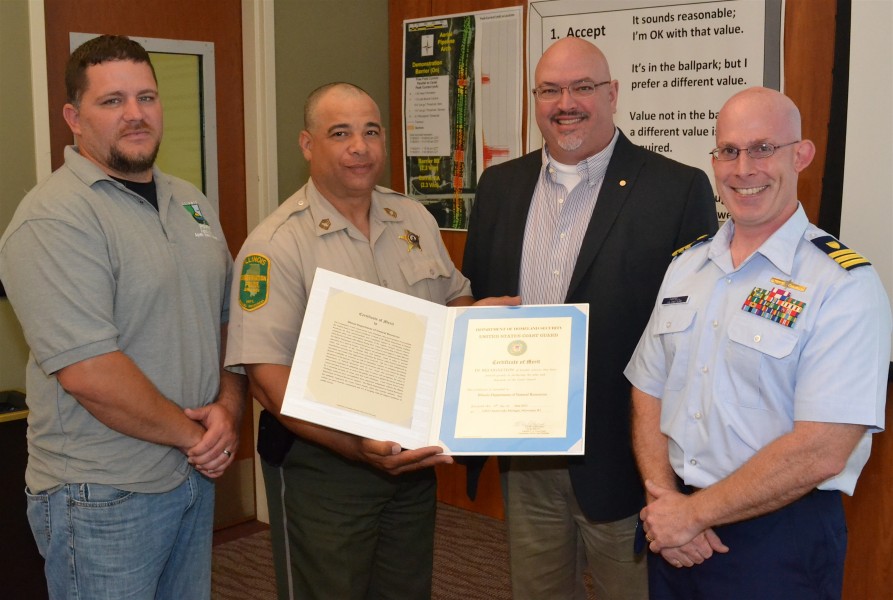 Coast Guard presents award to Illinois Department of Natural Resources for partnership during Fish Barrier operations 130618-G-PL299-006