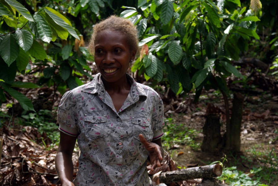 Cocoa farmer Flora Kebu explains her farming process at Kebu farm. (10687144284)