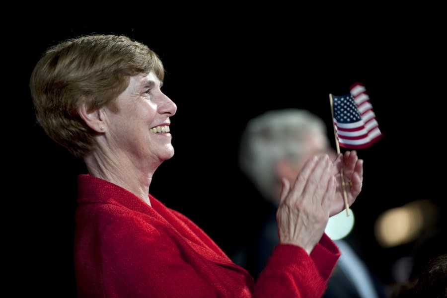 Deborah Mullen claps during the playing of the Armed Service Medley, 2011