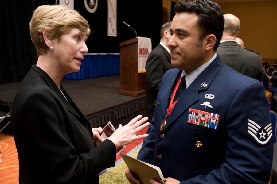 Deborah Mullen speaks with U.S. Air Force Staff Sgt. Robert Gutierrez, 2009