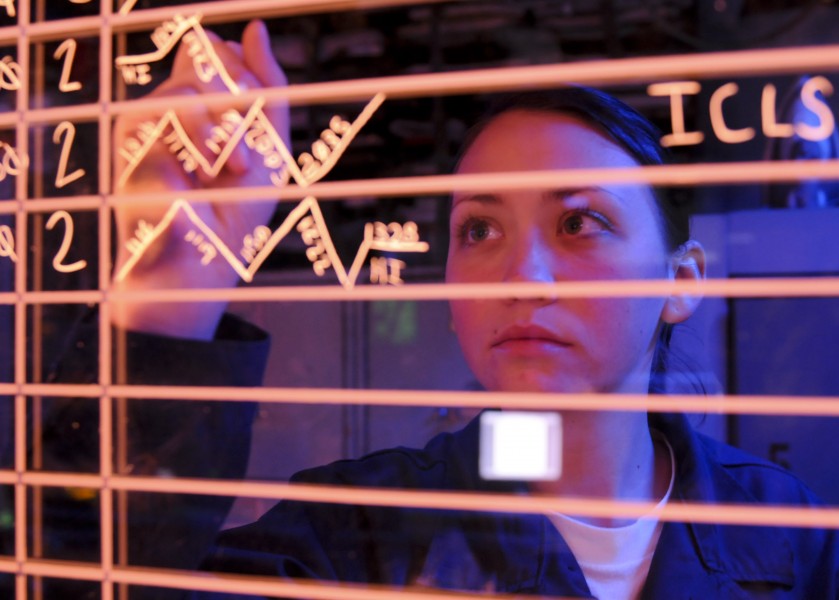 Defense.gov News Photo 100921-N-9950J-163 - U.S. Navy Airman Chelsea Pitchford updates information on an aircraft status board in the amphibious air traffic control center aboard the