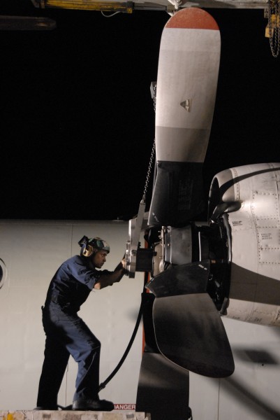 Defense.gov News Photo 110620-N-WF583-067 - Petty Officer 2nd Class Omar Viraclass assigned to Patrol Squadron 45 installs a propeller on the number two engine of a P-3C Orion aircraft in