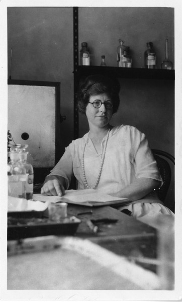 Elizabeth M. Bright, sitting in lab (3321953921)