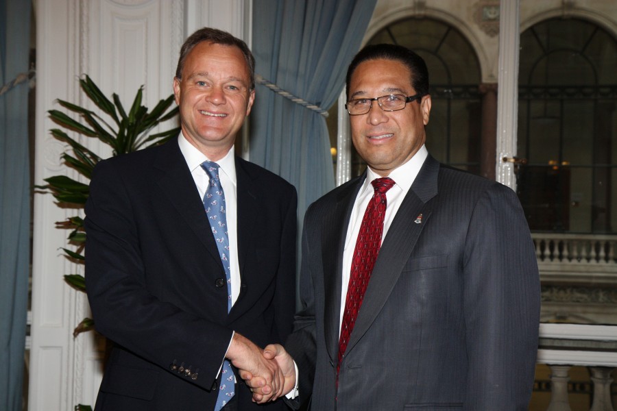 Foreign Office Minister Mark Simmonds with Cayman Islands Premier Alden McLaughlin in London, 13 June 2013
