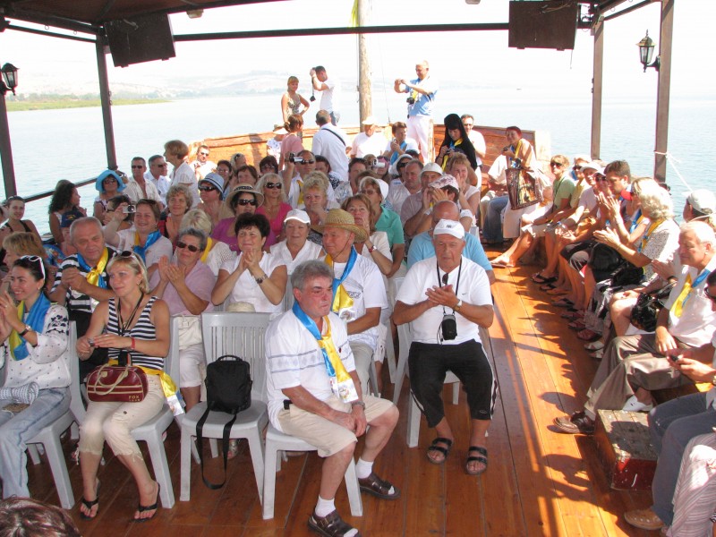 Christian pilgrims on a boat at the Galilean Sea (Lake) in Israel (where Jesus Christ preached), picture 15