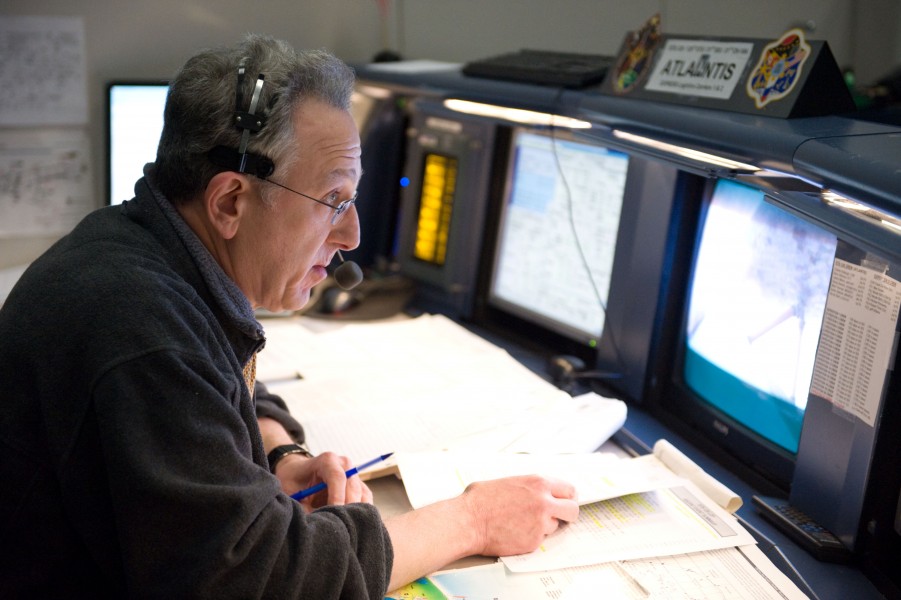Rob Navias at console during STS-129 launch countdown (JSC2009-E-240946)
