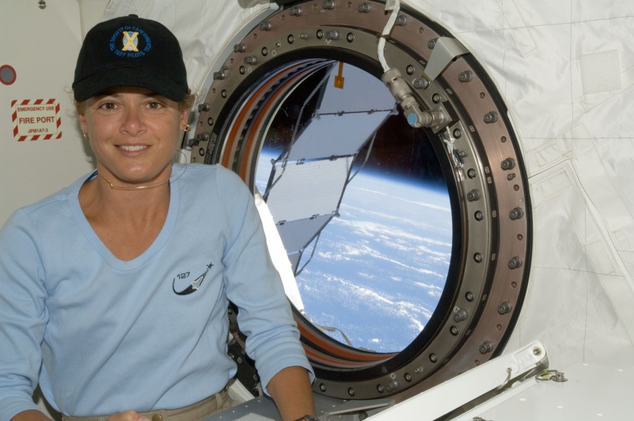 STS-127 Julie Payette near a window in the Kibo lab