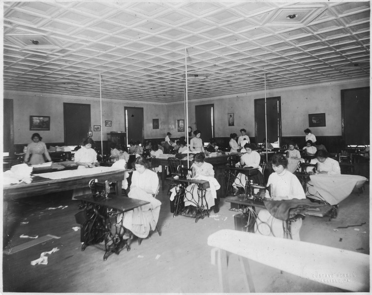 The School sewing room. Indian girls receive instruction in sewing, dressmaking, fancy sewing, drafting, darning... - NARA - 298641