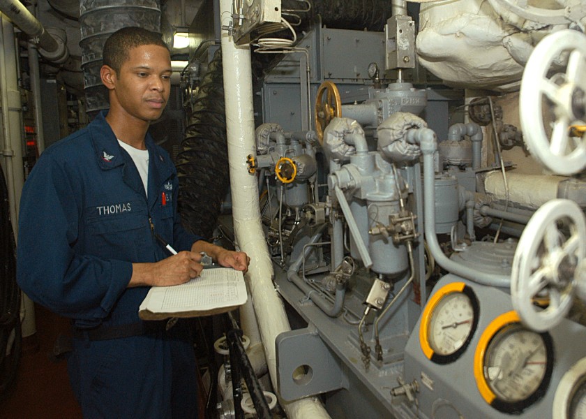 US Navy 030625-N-2819P-007 Machinist^rsquo,s Mate 3rd Class Kemetrick D. Thomas from Shreveport, La., reads and checks generator gauges