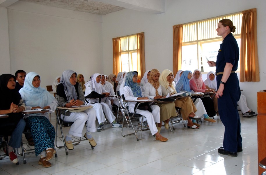 US Navy 050223-N-8796S-046 Lt. Terry Moraca, a U.S. Navy nurse and dietitian assigned to the Military Sealift Command (MSC) hospital ship USNS Mercy (T-AH 19), speaks to Indonesian nursing students