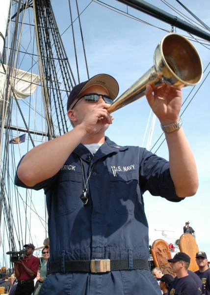 US Navy 060901-N-5322S-001 Boatswain^rsquo,s Mate 3rd Class Timothy Patrick, USS Constitution's Sailing Master, shouts sail commands