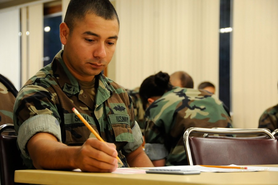 US Navy 110901-N-SI773-255 Builder 2nd Class Moses Silva takes the E-6 advancement exam at Naval Station Rota, Spain