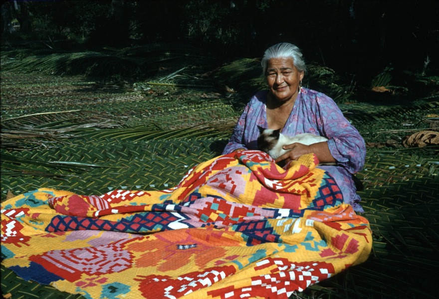 Woman sewing a tivaevae, Rarotonga