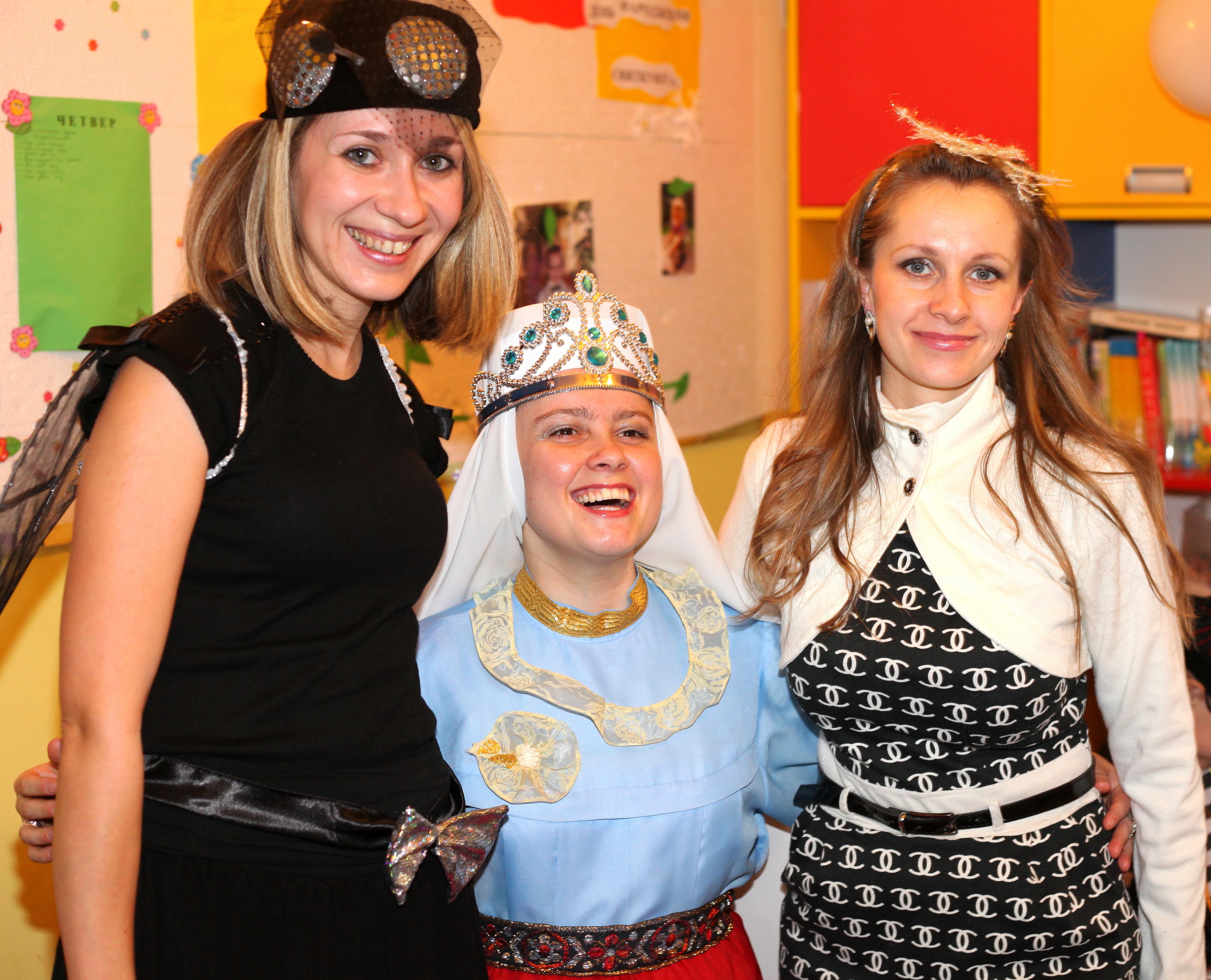 two young women and a nun in a Catholic kindergarten