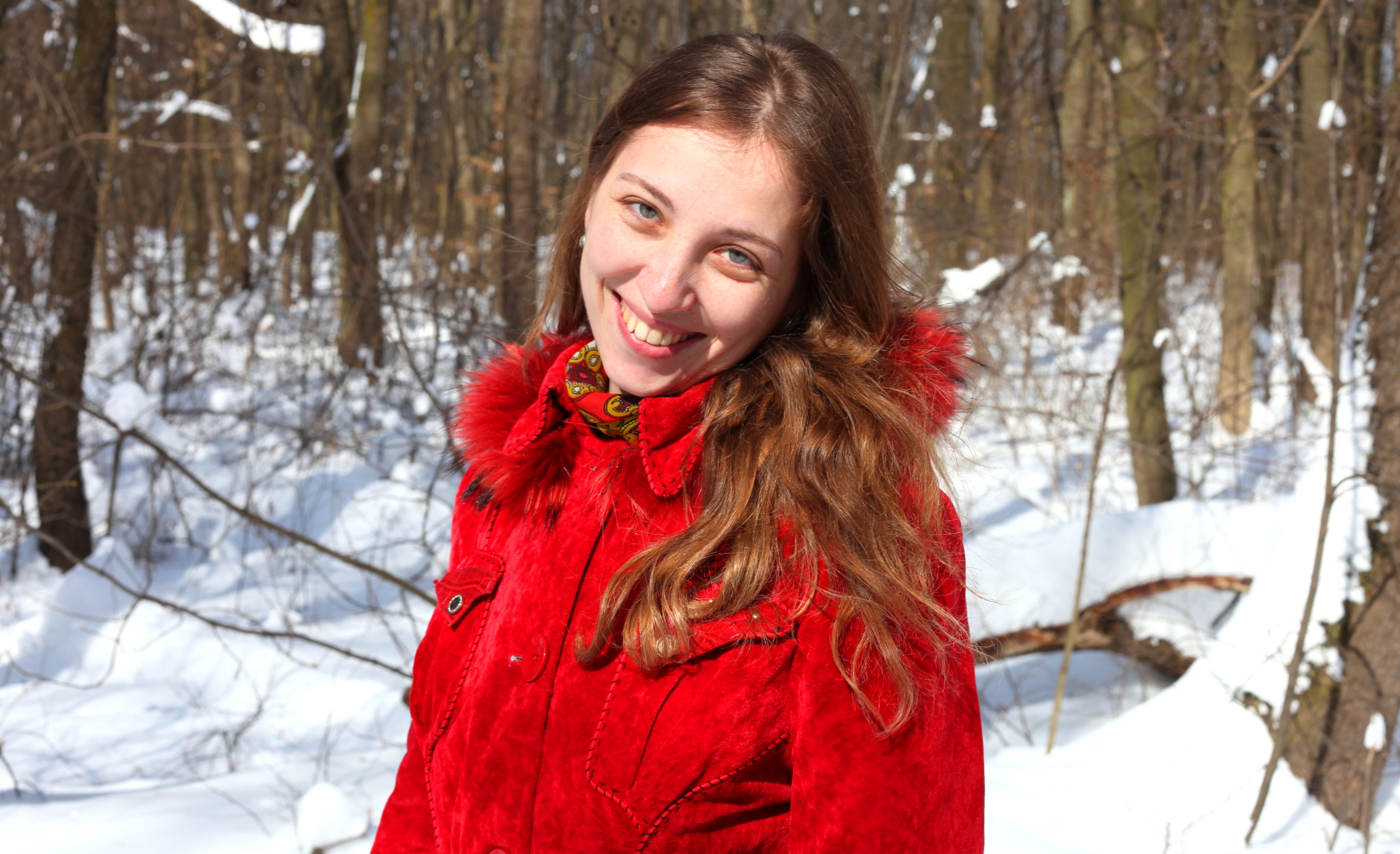 a charming beautiful attractive young Catholic woman in a snowy forest, photo 6