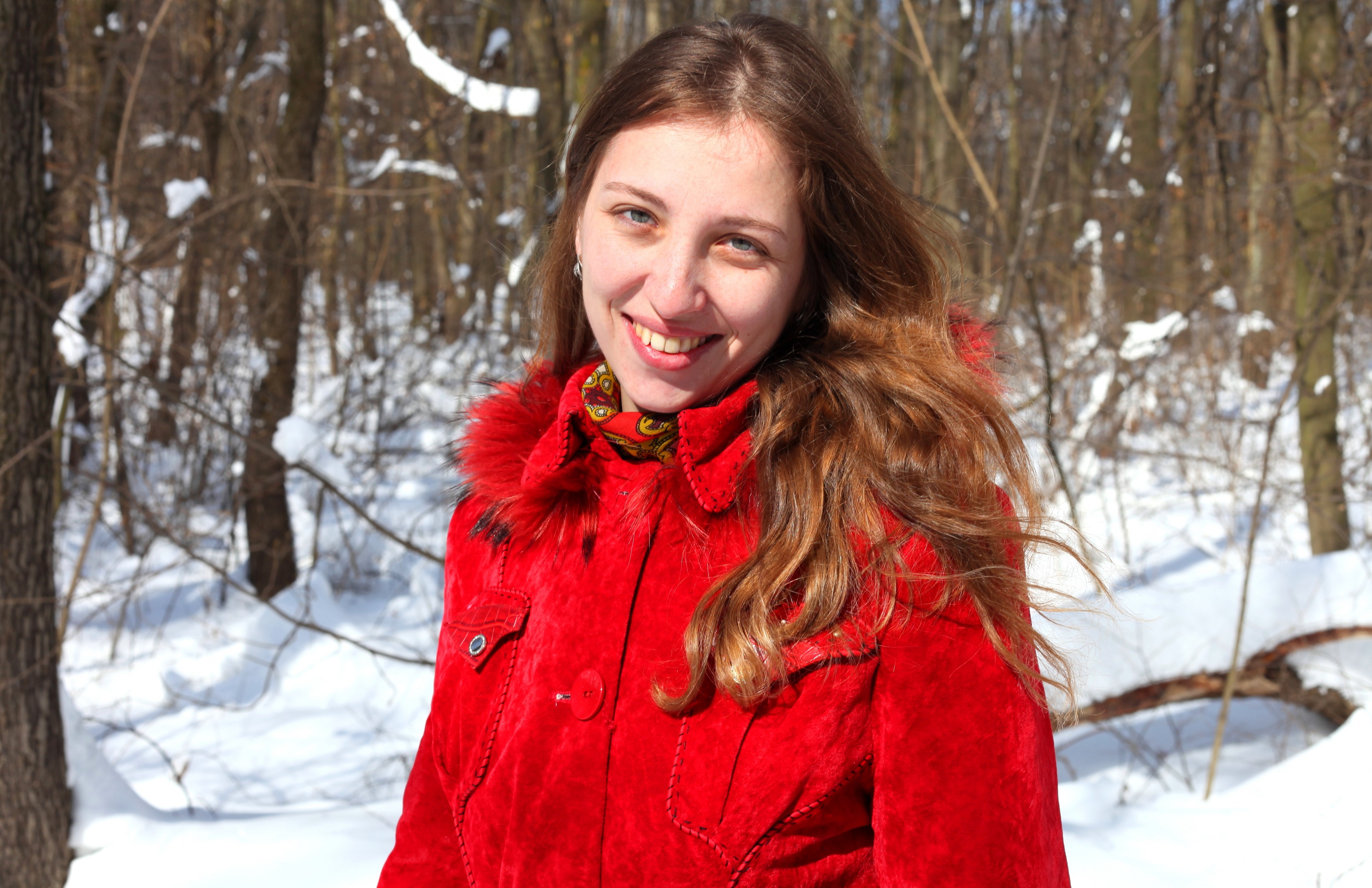 a charming beautiful attractive young Catholic woman in a snowy forest, photo 8