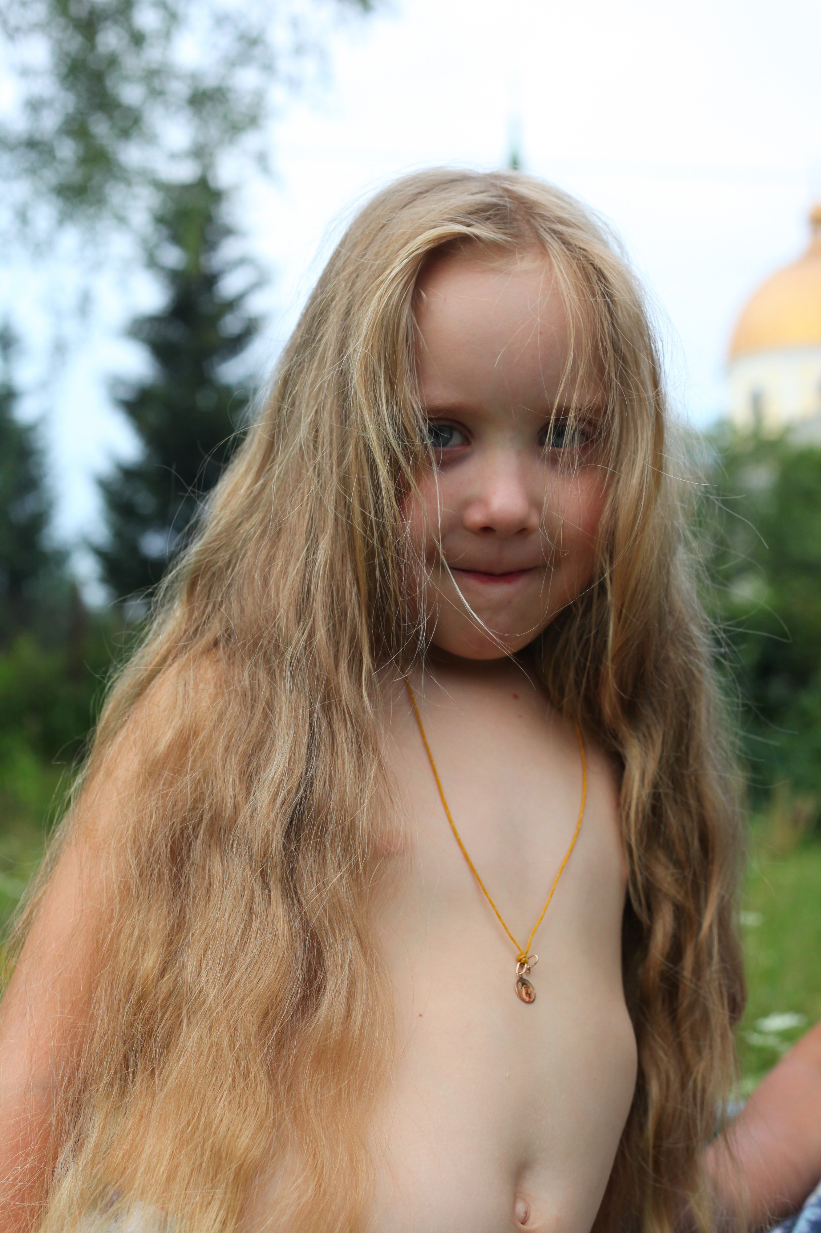 a child girl with a long fair hair