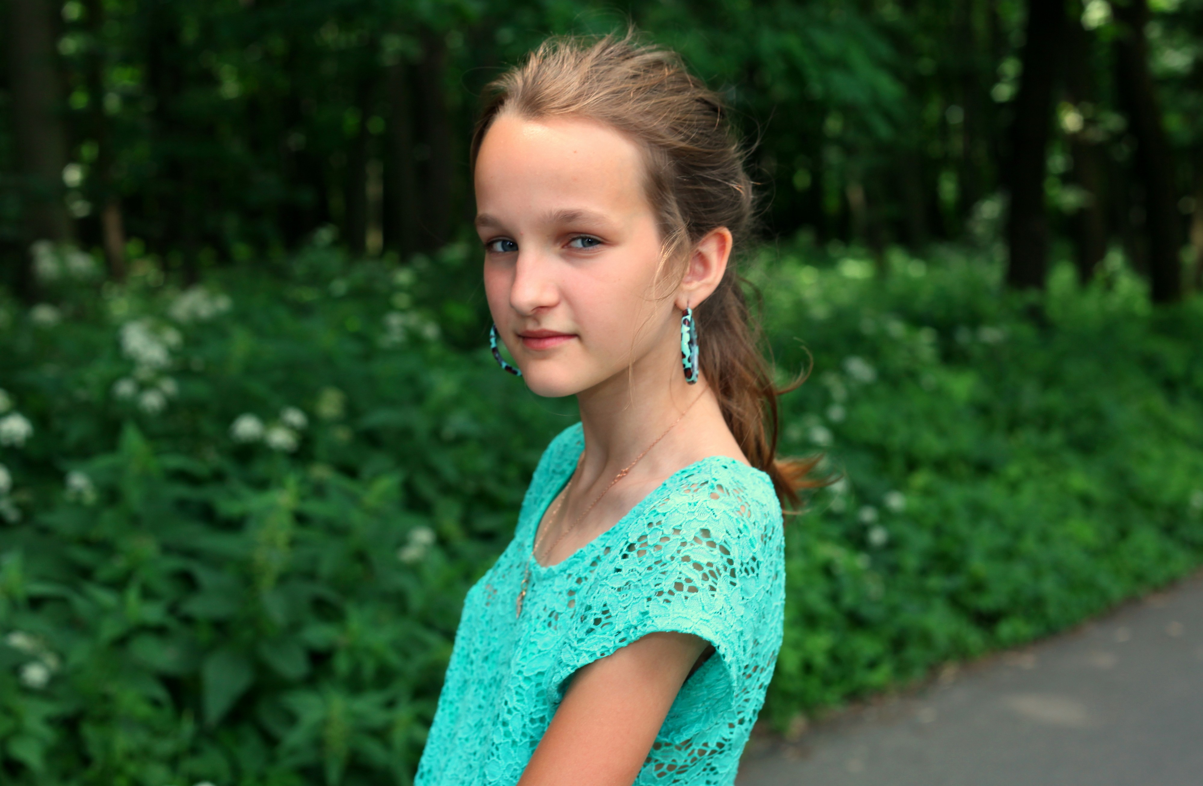 an absolutely beautiful Catholic girl with huge earrings, photographed in June 2013, portrait 27/27