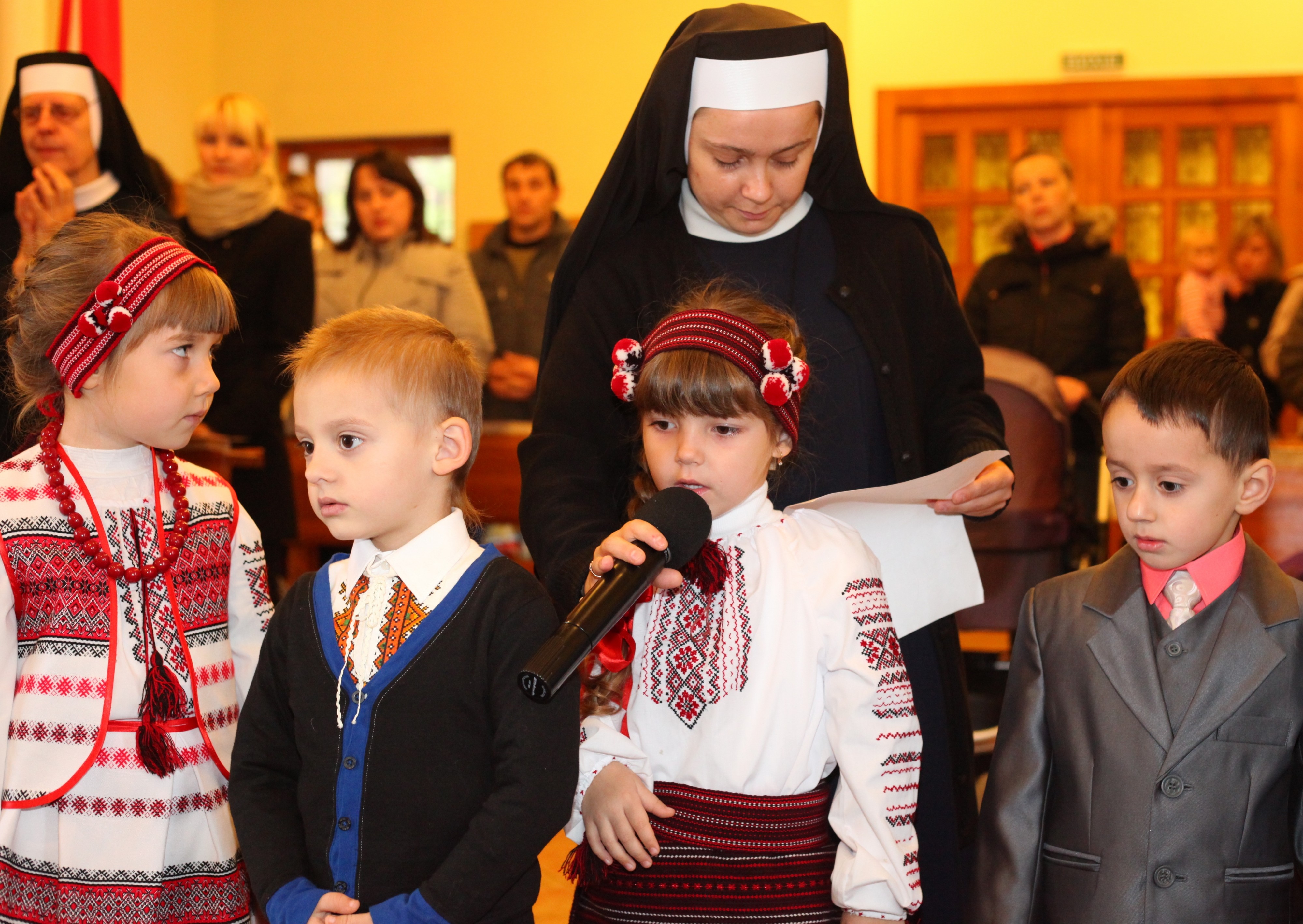 kids performing in a Catholic kindergarten