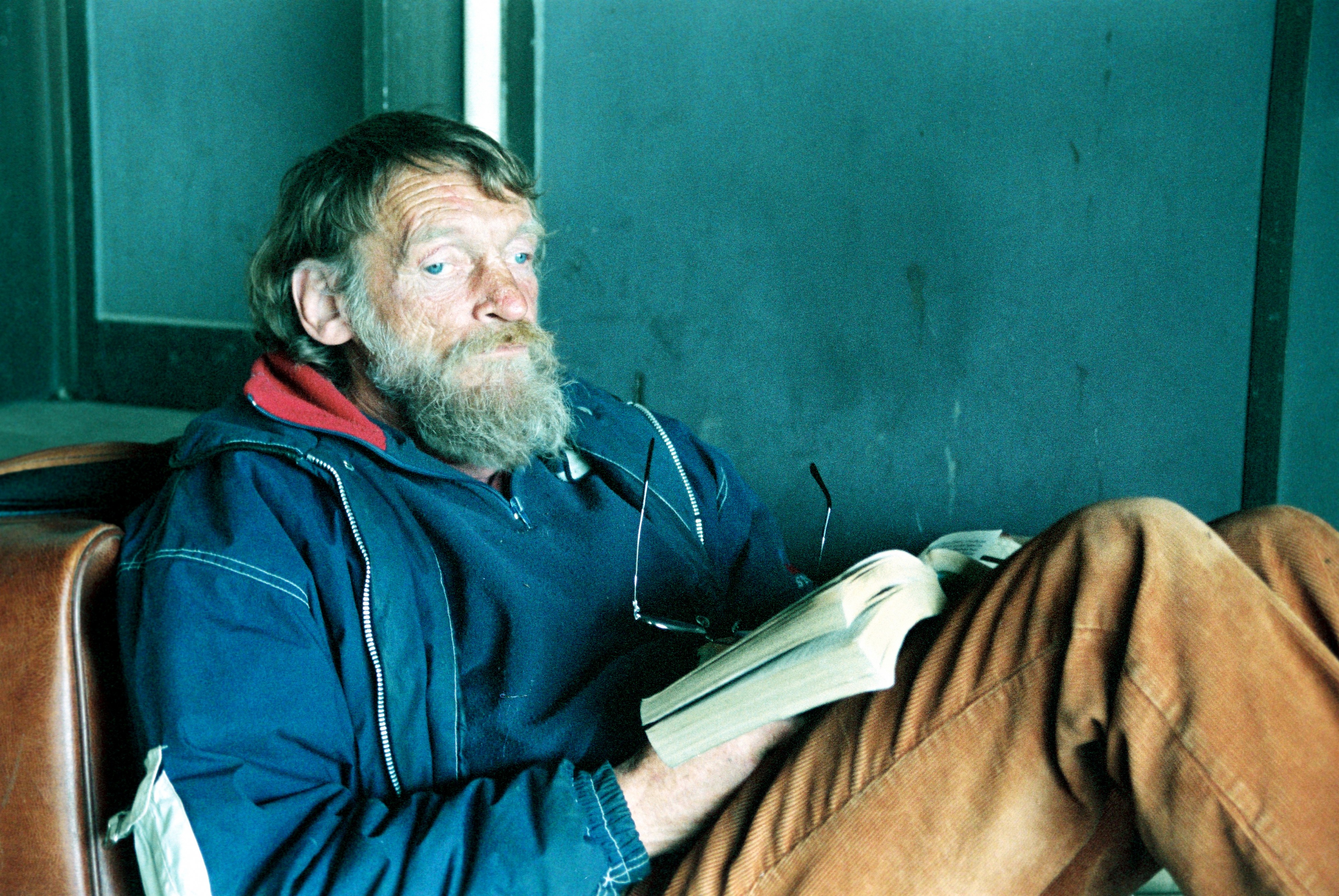 Poor man reading
