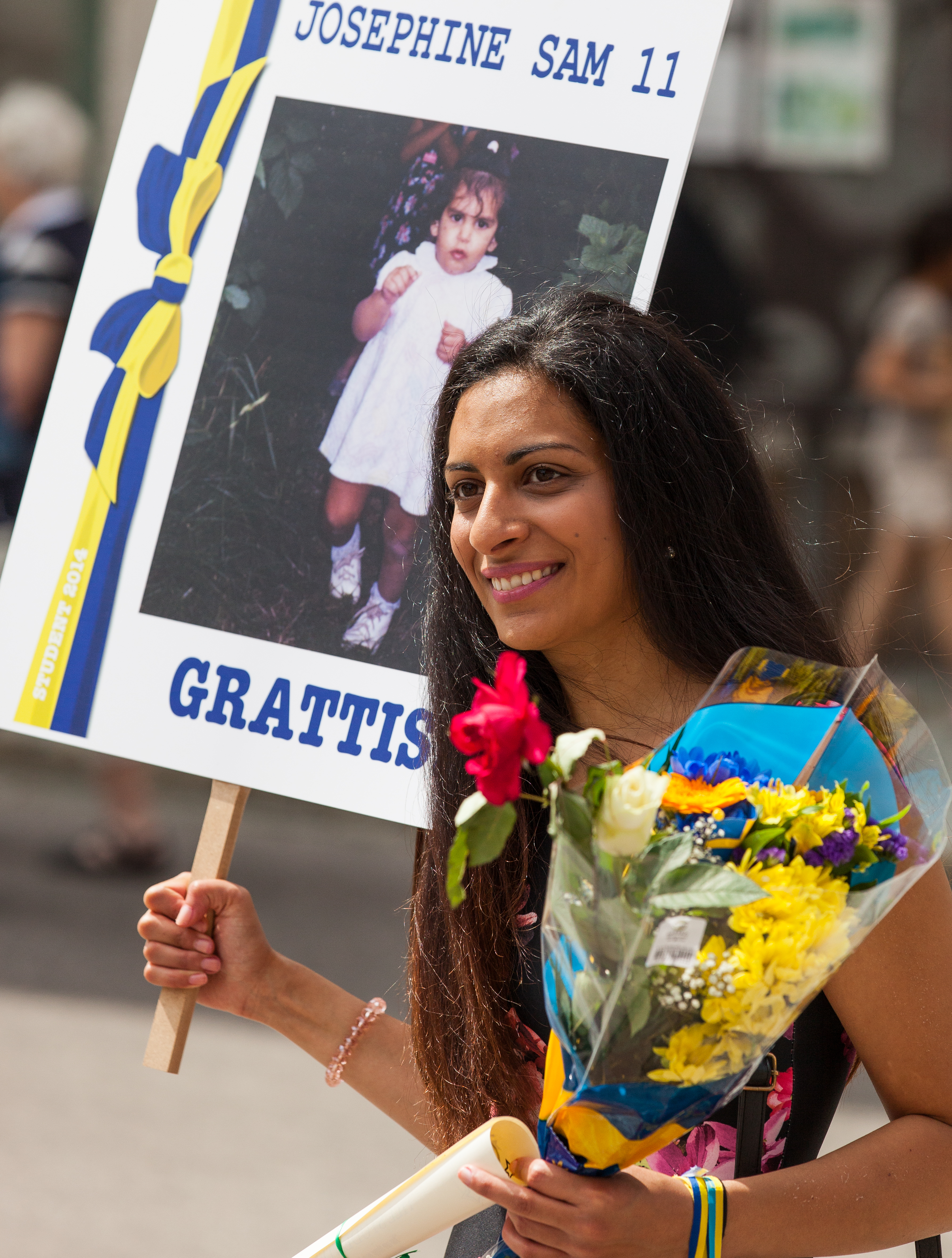 a girl on a graduation celebration in Uppsala, Sweden, in June 2014, picture 6