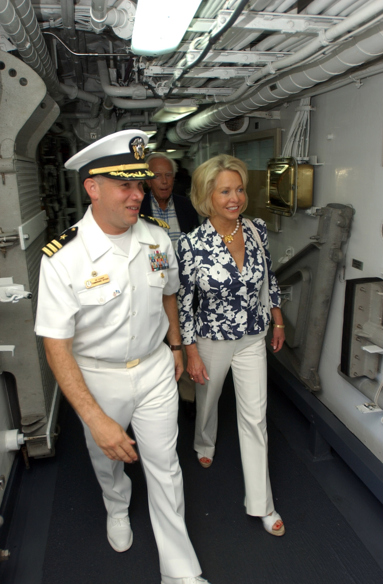 US Navy 080704-N-8943B-017 Cmdr. Edwin Kaiser, commanding officer of the guided-missile frigate USS Simpson (FFG 56) gives U.S. Ambassador to the Eastern Caribbean Mary Ourisman, a tour
