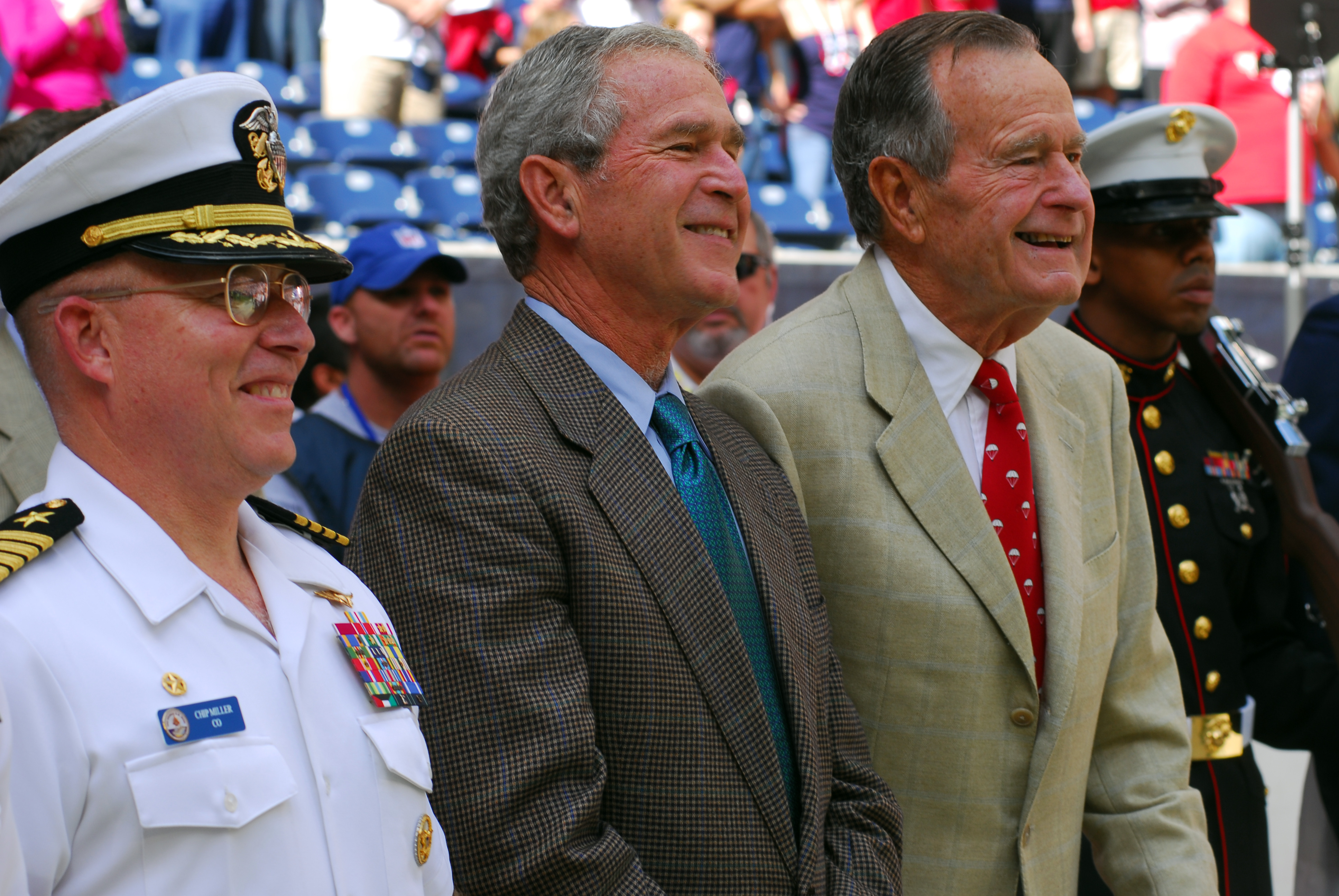 US Navy 091025-N-1854W-228 The Commanding Officer of USS George H.W. Bush (CVN 77) Capt. Chip Miller, left, and Presidents George W. Bush, center, and George H.W. Bush