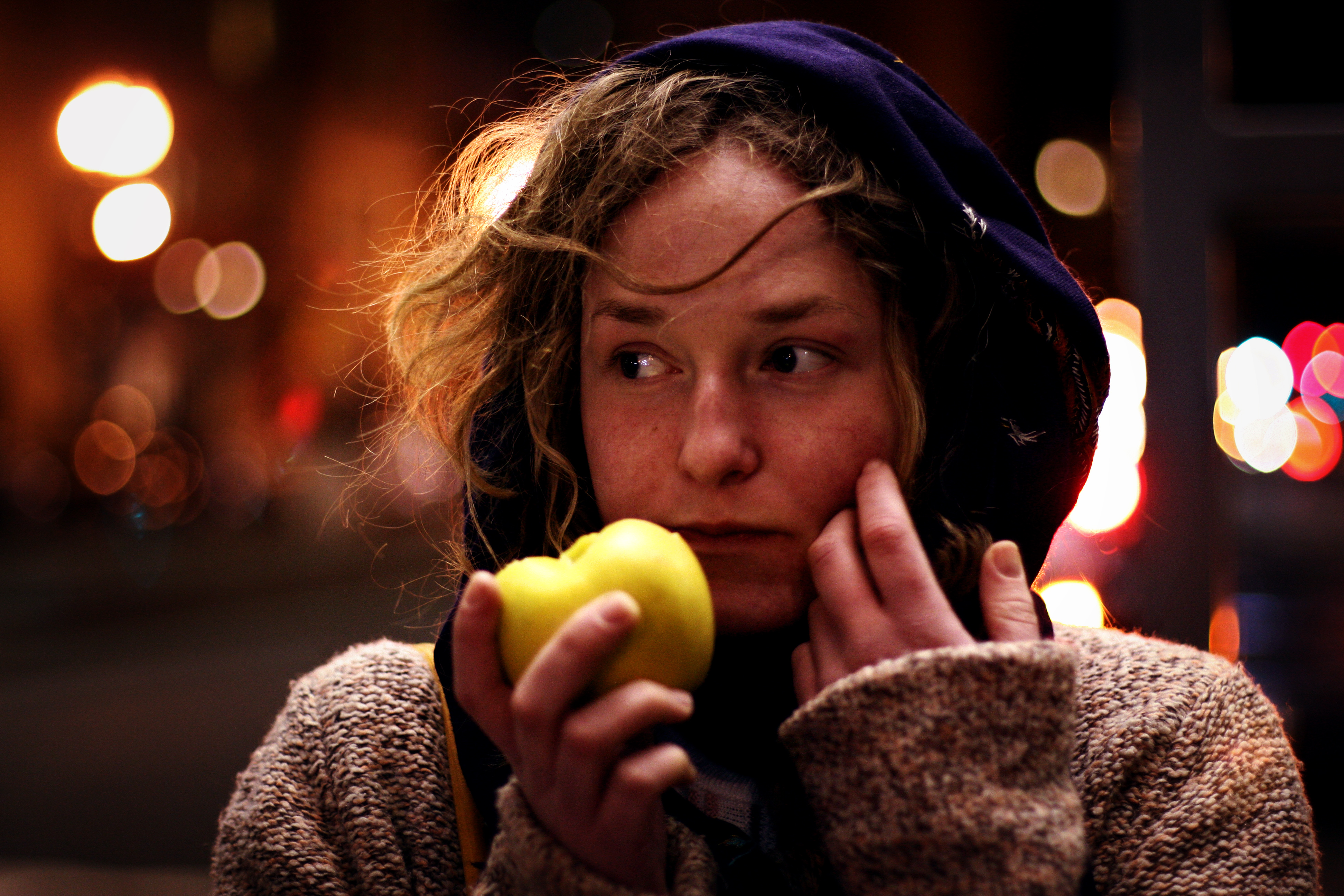 Woman eating an apple