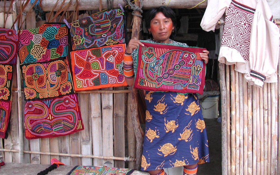 a Kuna woman with molas