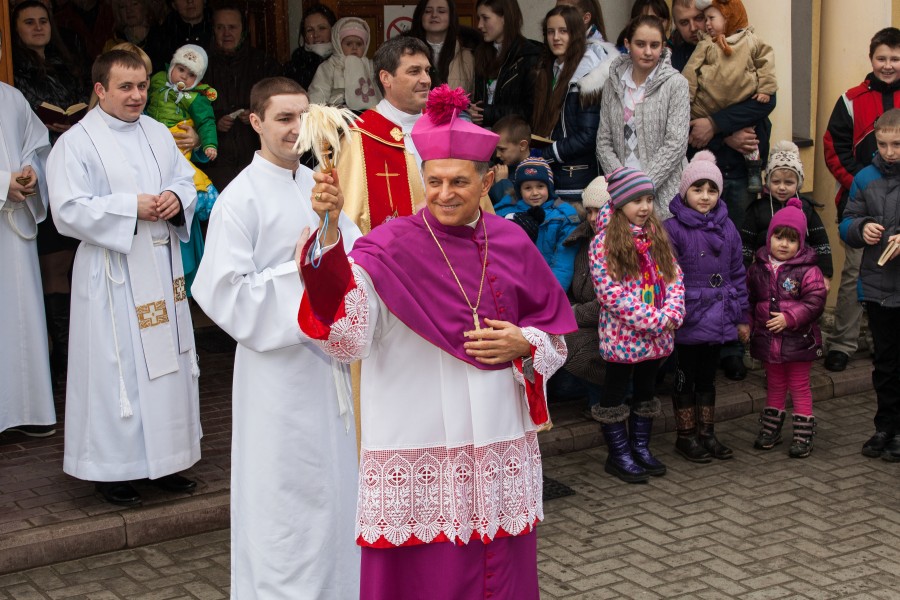 an archibishop visiting a parish in March 2014