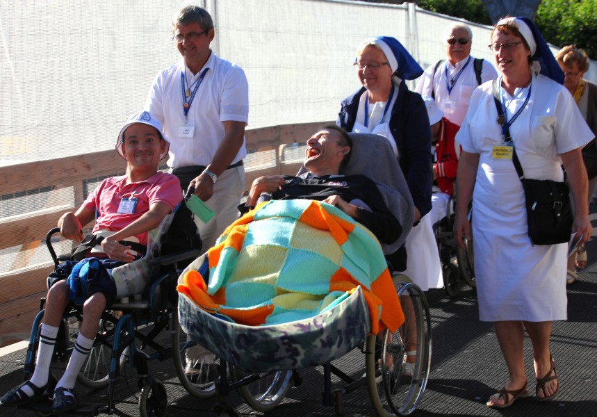 people on wheelchairs in Lourdes, France, August 2013, picture 10