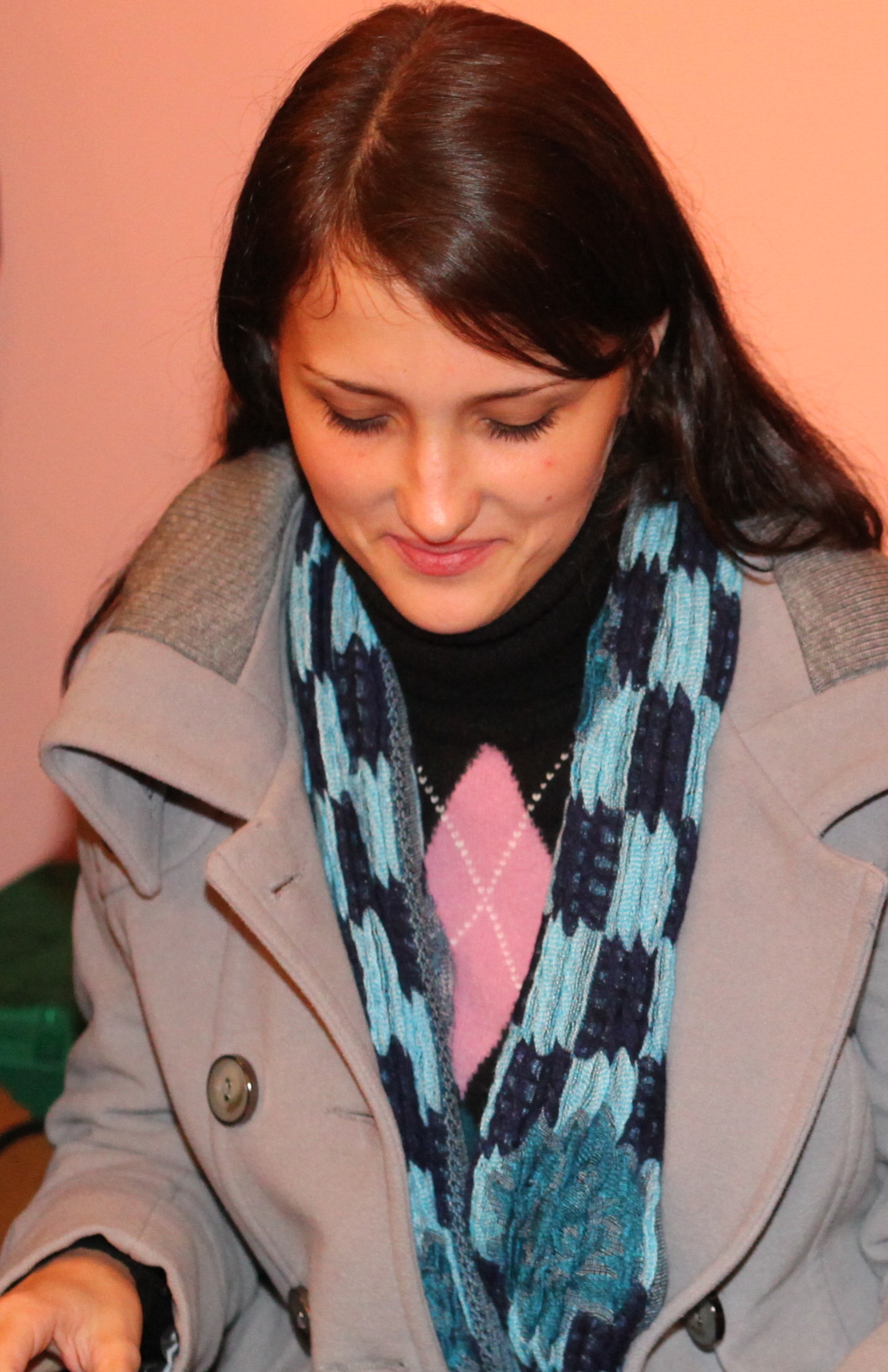 a beautiful brunette young Catholic woman in a Church, photo 2