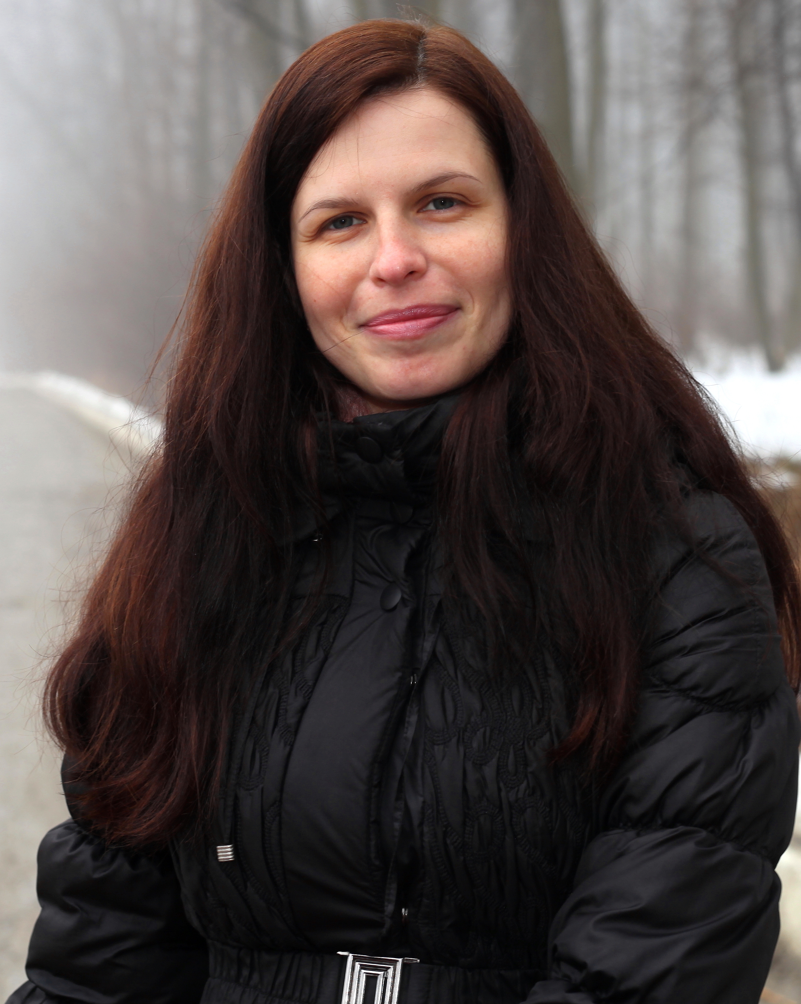 an amazingly beautiful charming Catholic woman in a forest, picture 2