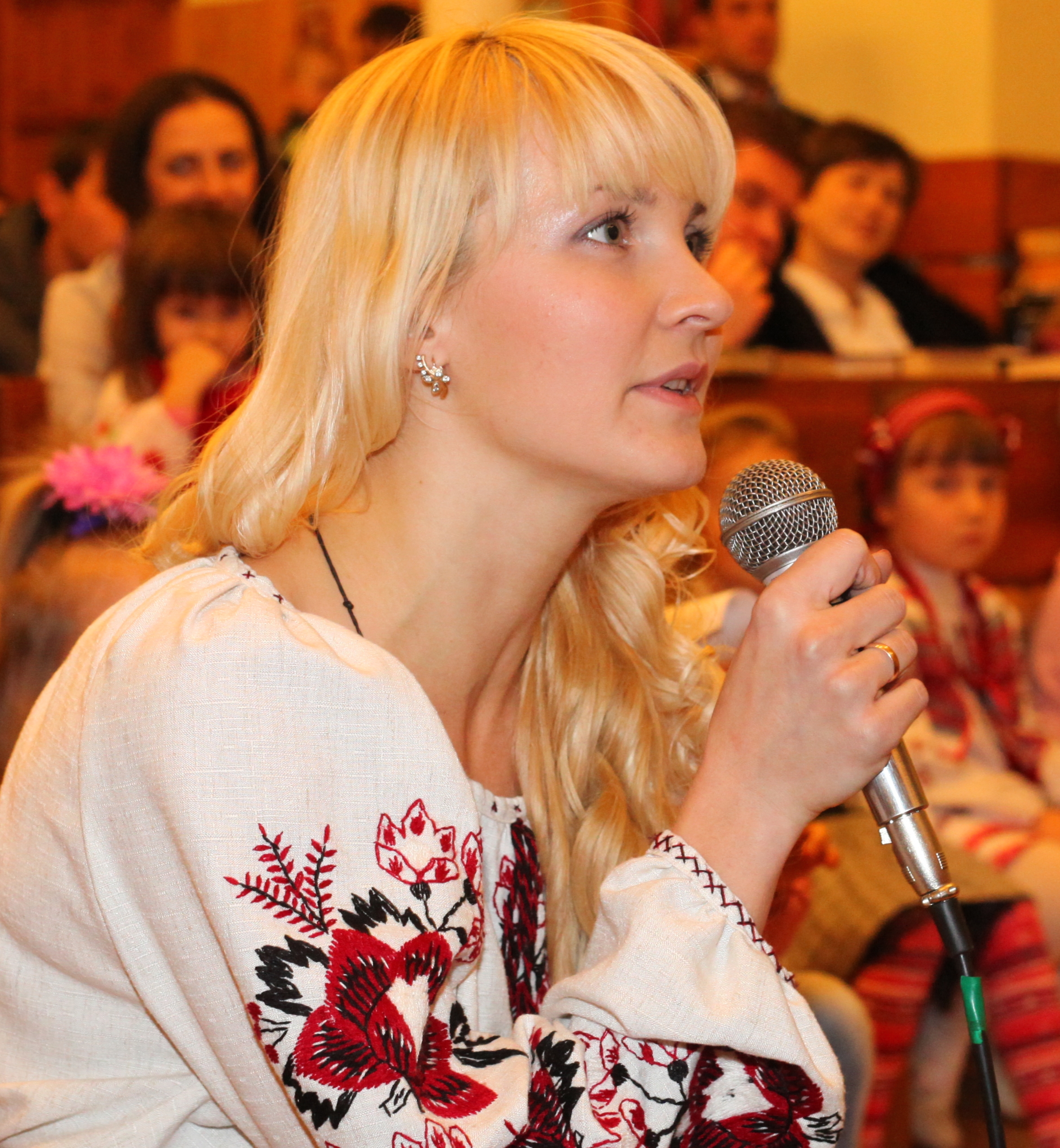 an amazingly tender, charming, feminine, beautiful young blond Catholic woman in a Church, photo 12