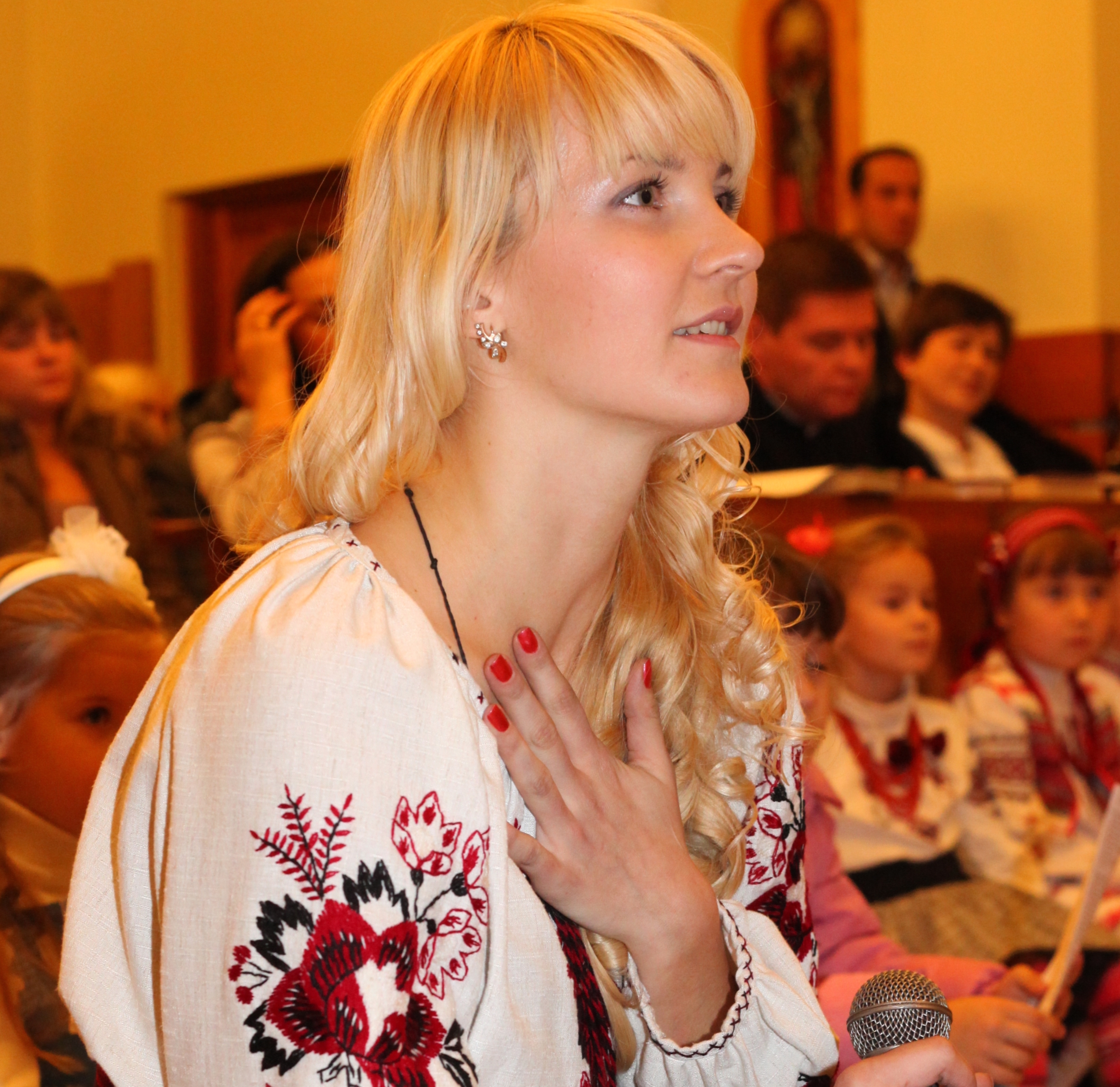 an amazingly charming and tender beautiful young blond Catholic woman in a Church, photo 16