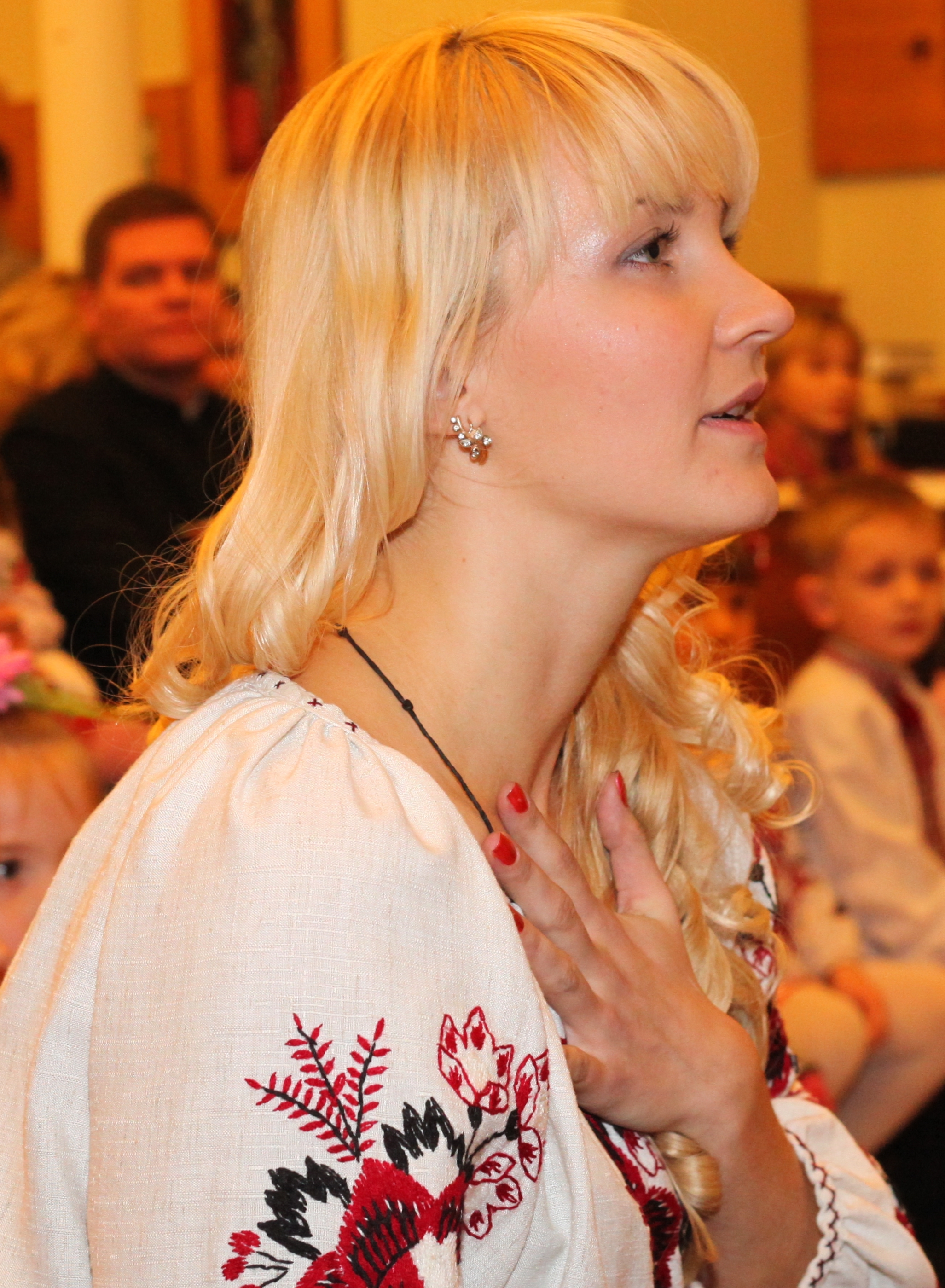 an amazingly tender and charming beautiful young blond Catholic woman in a Church, photo 9