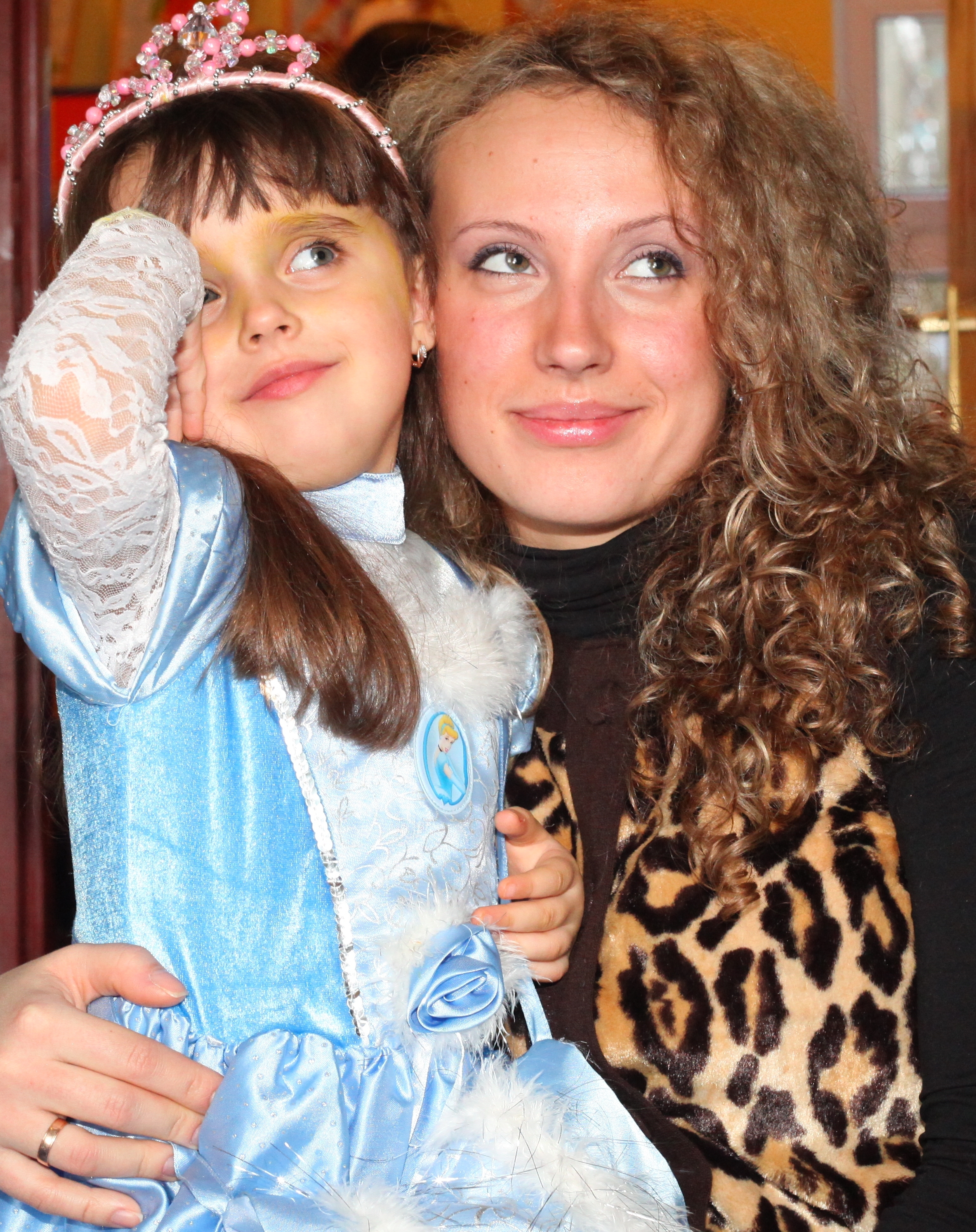 a beautiful curly woman with her daughter in a Catholic kindergarten, picture 6
