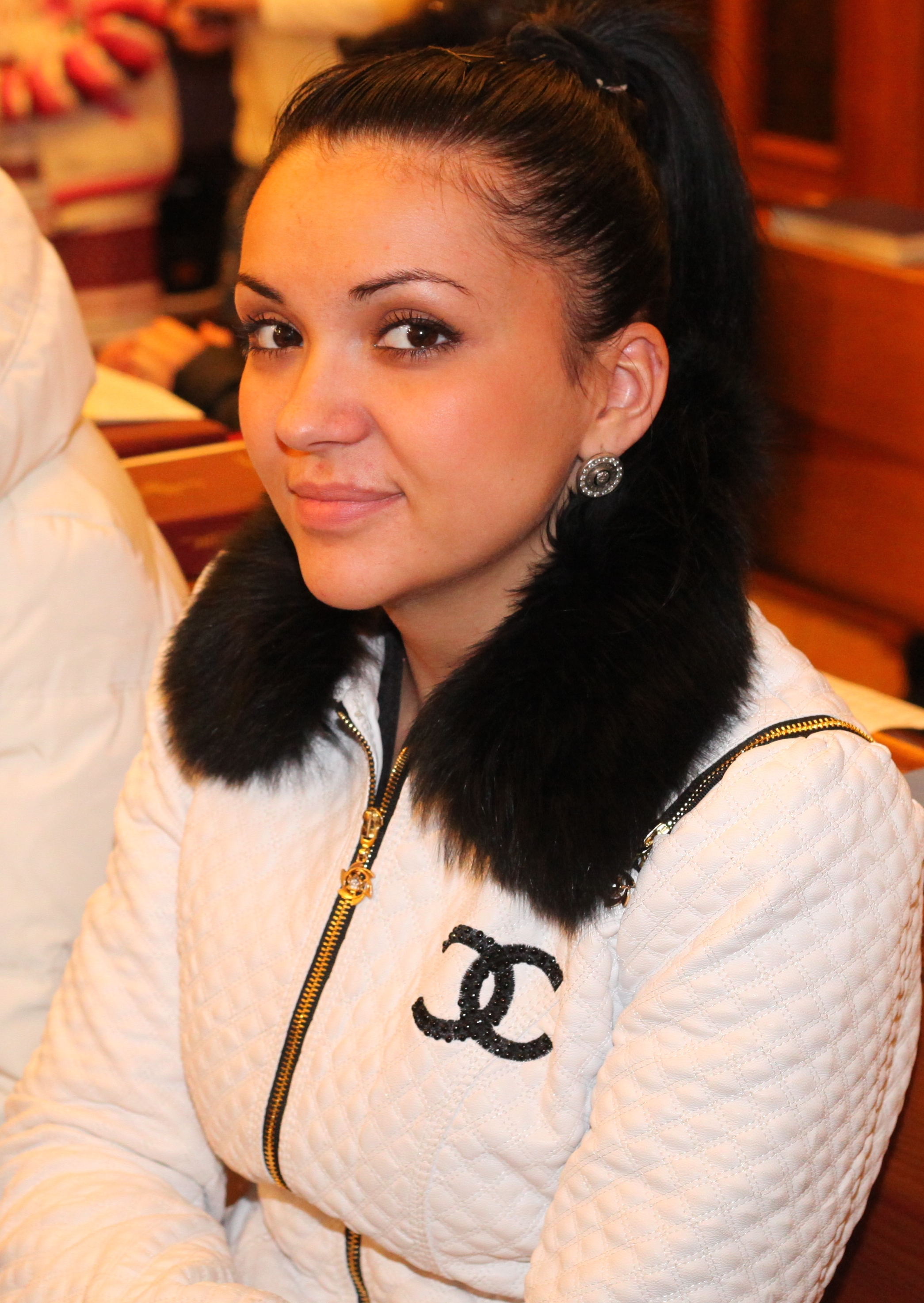 a pretty, tender brunette Catholic woman in a Church, photo 2