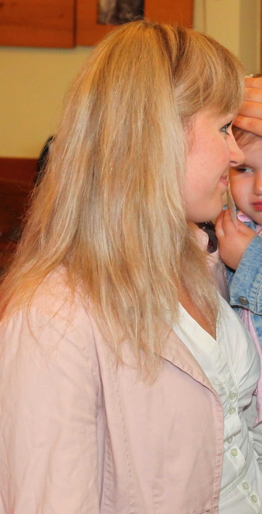 A beautiful charming appealing blond young woman / girl / chick