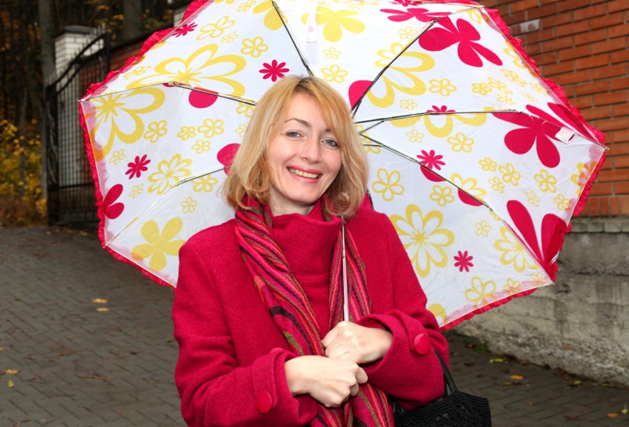 a beautiful Catholic woman with an umbrella, picture 1