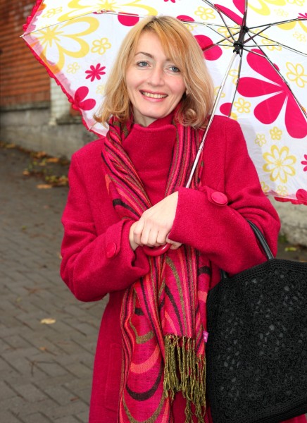 a beautiful Catholic woman with an umbrella, photo 3