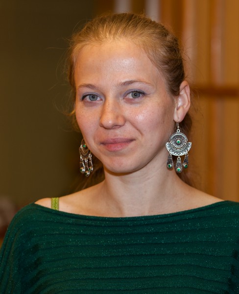 a fair-haired young woman photographed in October 2013, picture 2/6