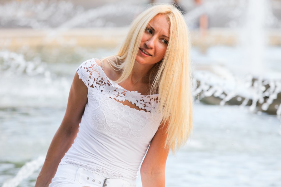 a blond young pretty woman photographed in August 2013