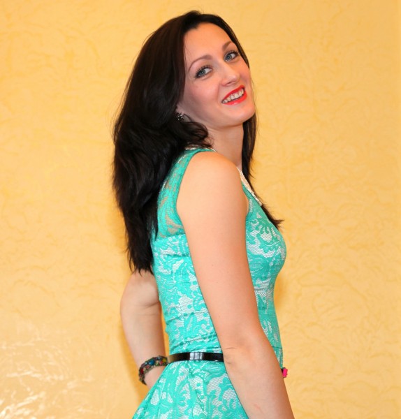 a young brunette woman in a summer dress in June 2013, portrait 2 out of 10