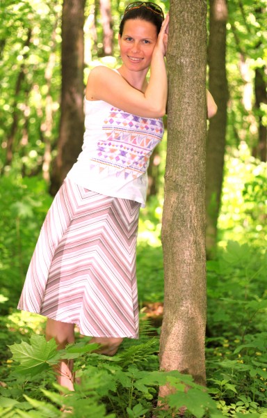 an amazingly feminine and beautiful brunette Catholic woman in a forest in May 2013, picture 3