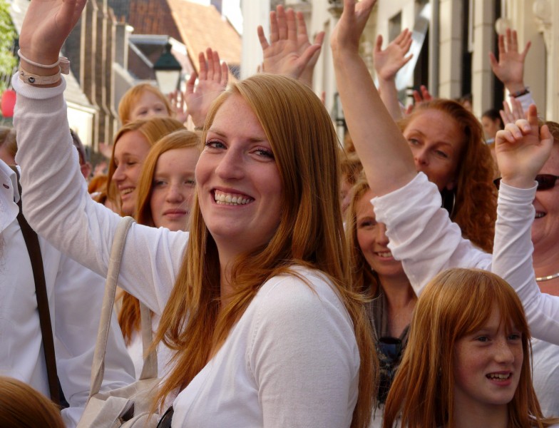 Girls waving at Redhead Day 2010