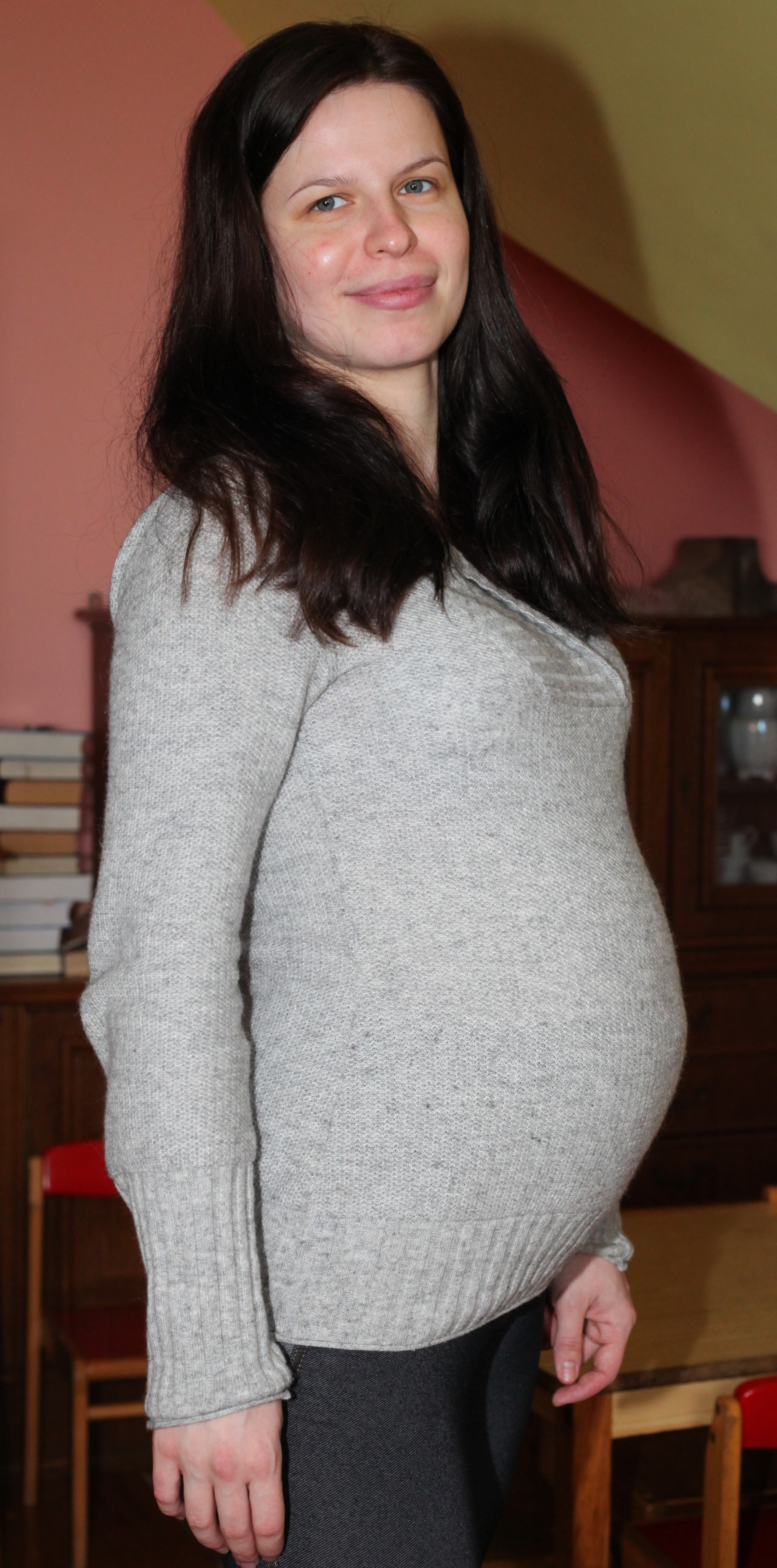 a pregnant beautiful brunette Catholic woman, picture 4