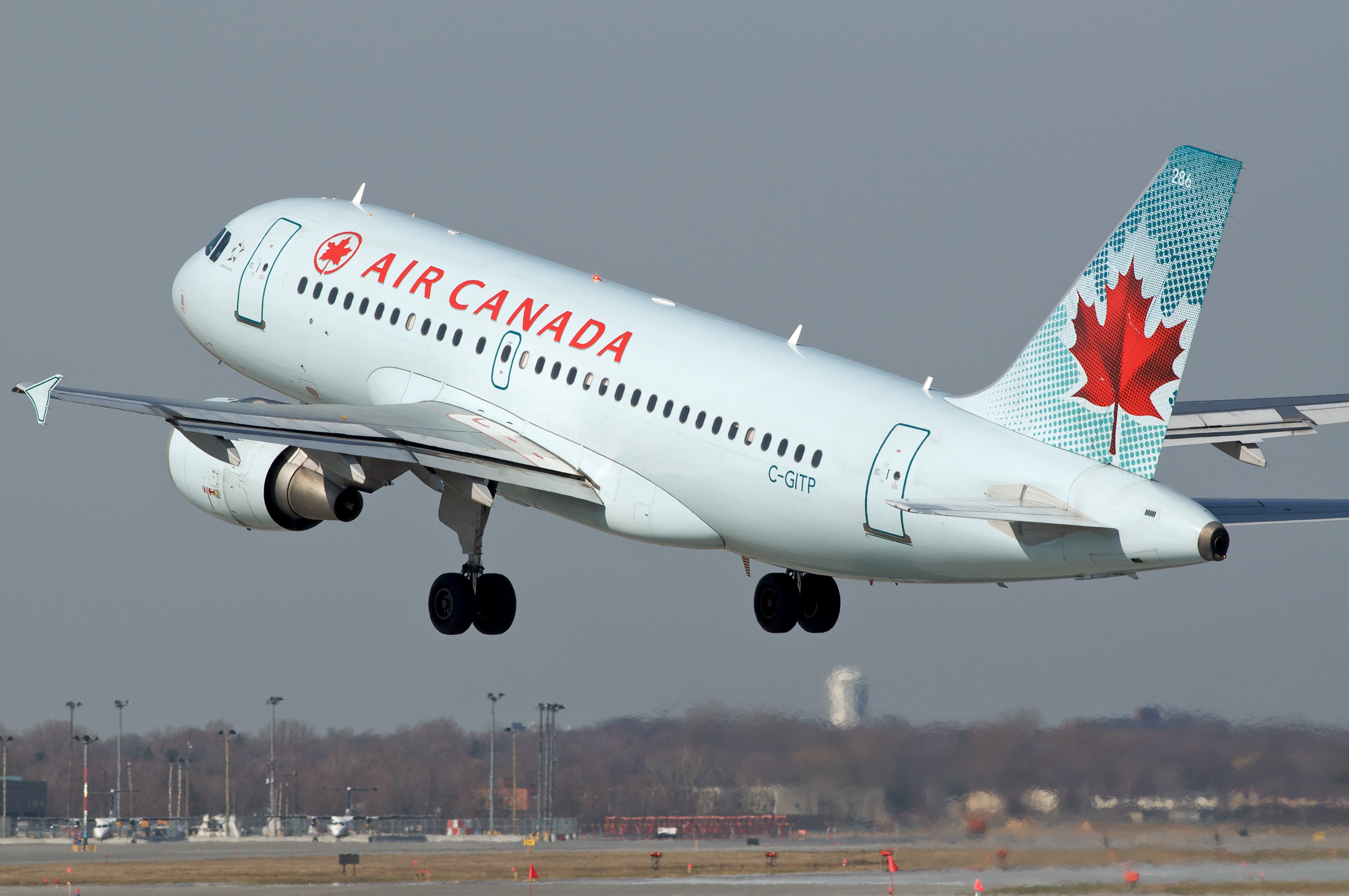 Air Canada A319 C-GITP departing YUL